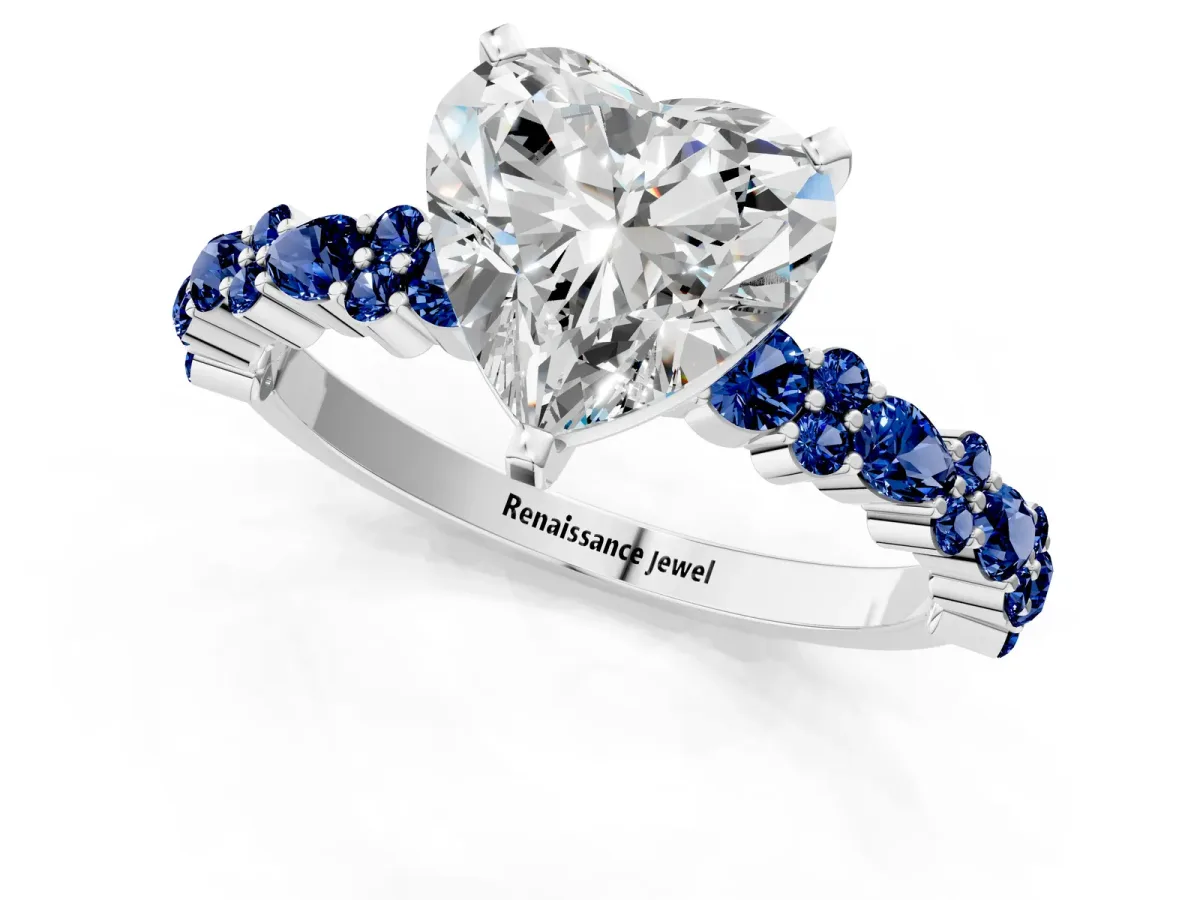 Heart Cut Diamond Side Stone Solitaire Ring with Round Blue Sapphire and Four-Prong Setting White gold