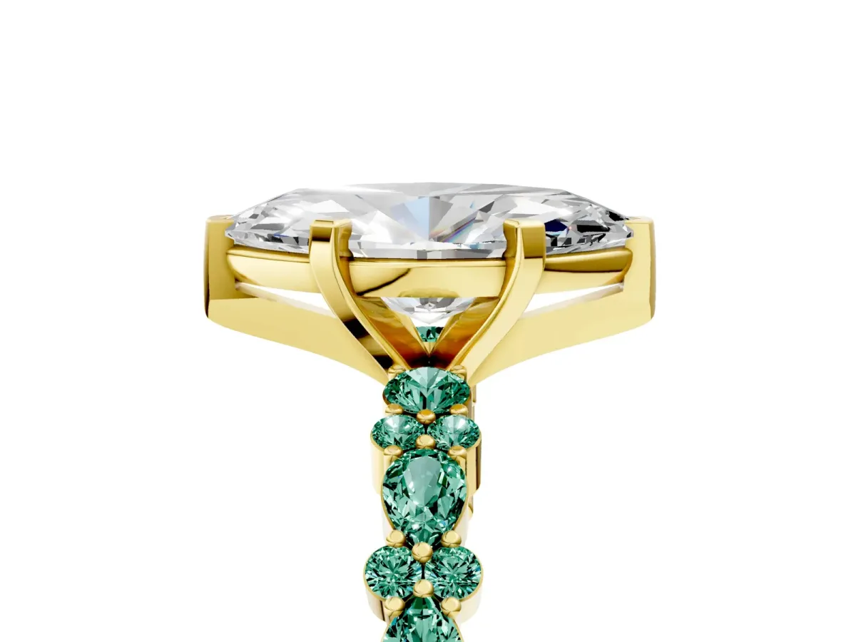 Marquise Cut Diamond Side Stone Solitaire Ring with Round Green Sapphire and Four-Prong Setting Yellow gold