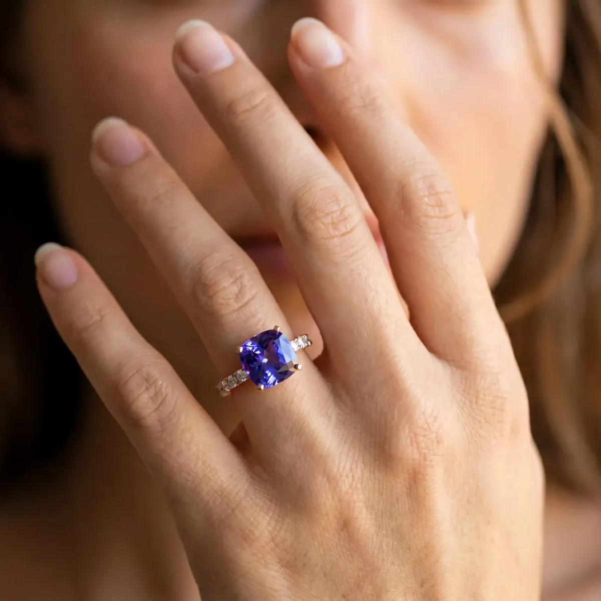 Cushion Cut Tanzanite Solitaire Ring with Round Pavé Band and Four-Prong Setting Rose gold
