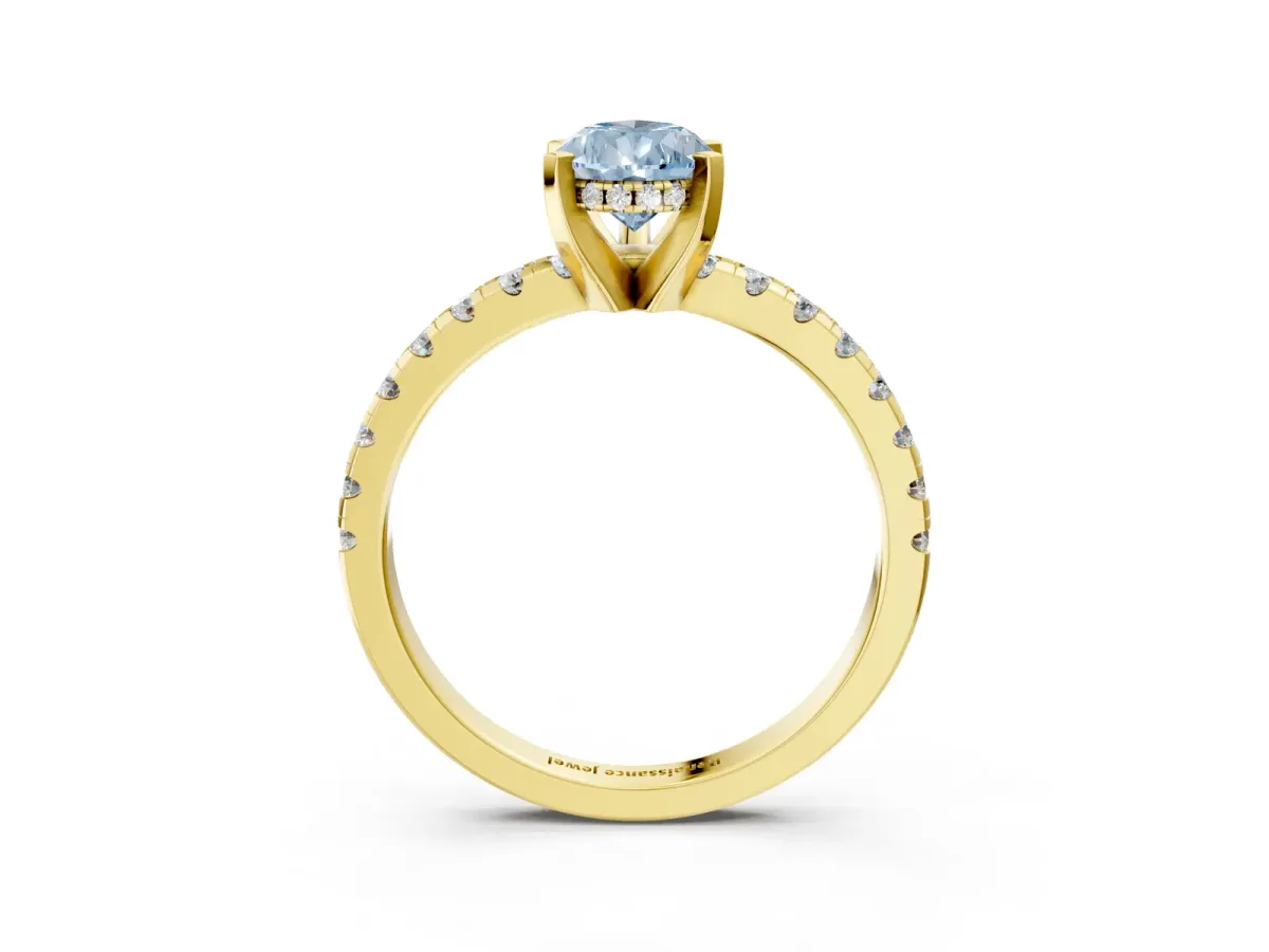 Fancy Blue Pear Cut Diamond Solitaire Ring with Round Pavé Band and Four-Prong Setting Yellow gold