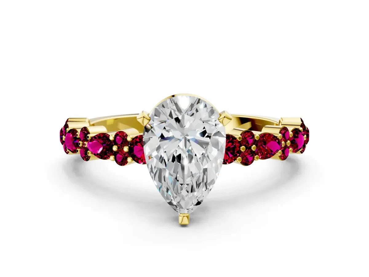 Pear Cut Diamond Side Stone Solitaire Ring with Round Garnet and Four-Prong Setting Yellow gold