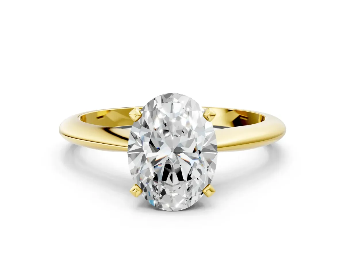 Oval Cut Diamond Solitaire Engagement Ring with Classic Band and Four-Prong Setting Yellow gold
