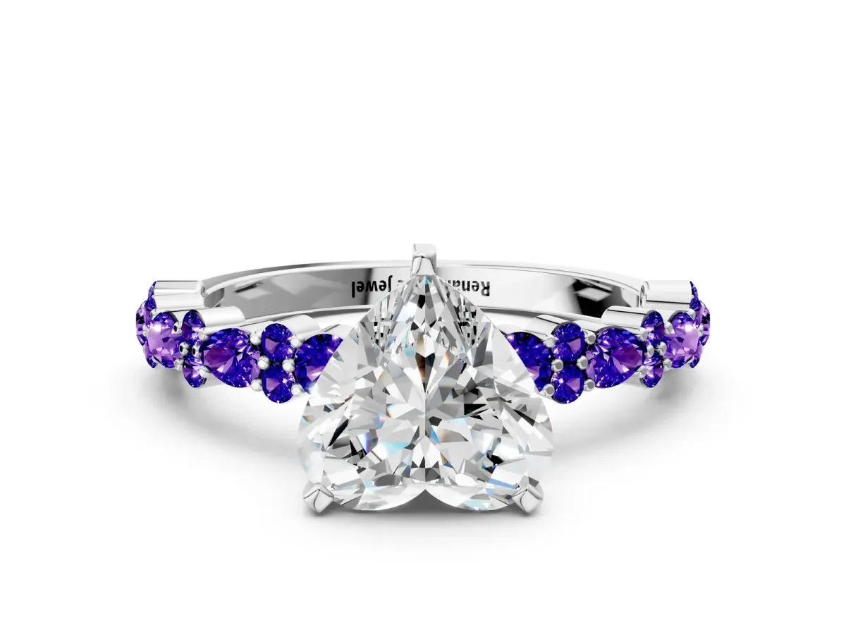 Heart Cut Diamond Side Stone Solitaire Ring with Round Tanzanite and Four-Prong Setting Platinum