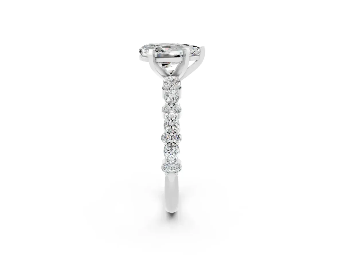 Pear Cut Moissanite Side Stone Solitaire Ring with Round and Four-Prong Setting White gold