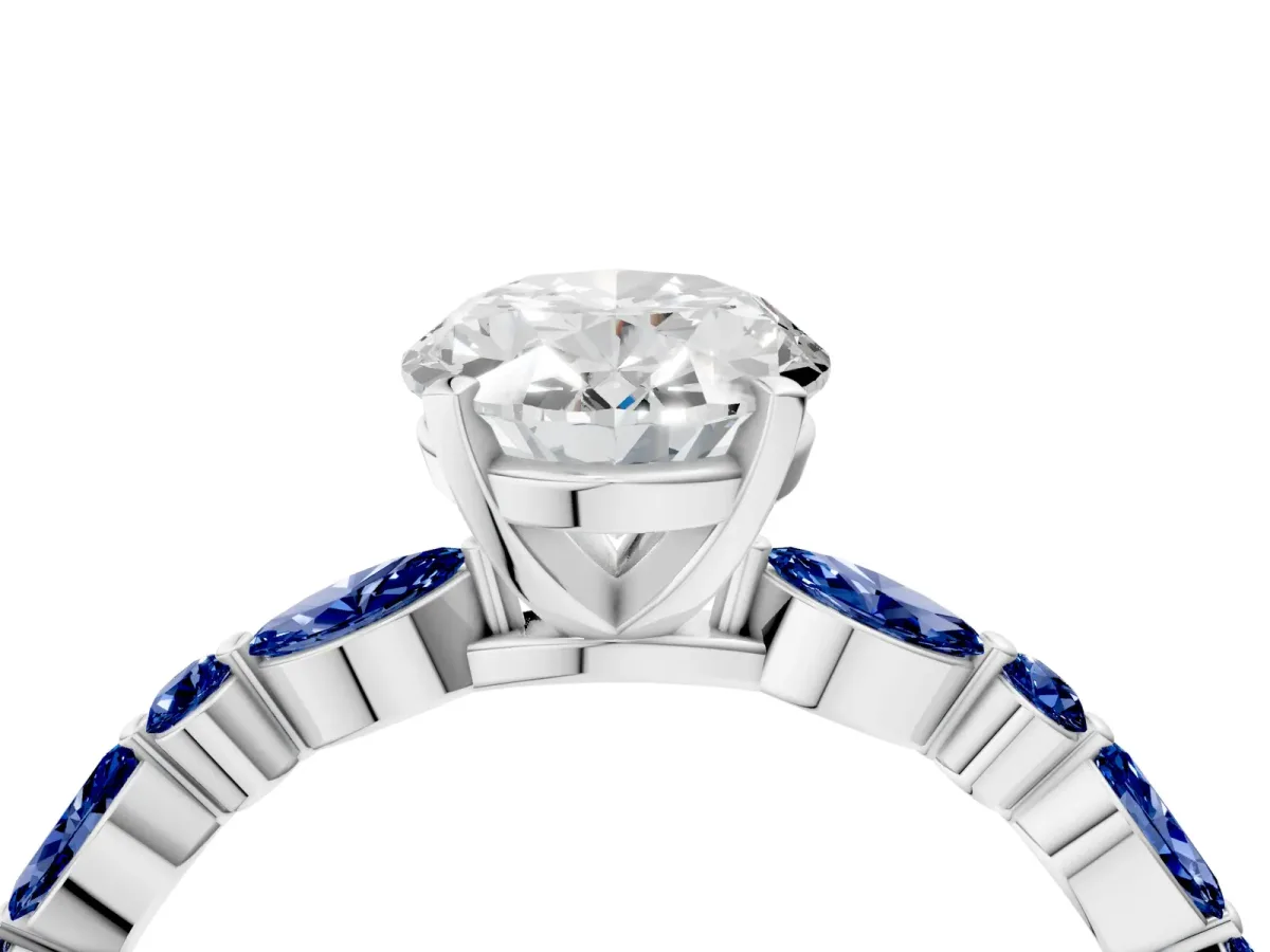 Oval Cut Diamond Ring with Marquise and Round Blue Sapphire Side Stones and Four-Prong Setting Silver