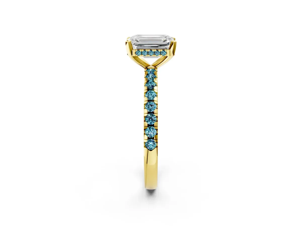 Emerald Cut Diamond Solitaire Ring with Round Blue Topaz Pavé Band and Four-Prong Setting Yellow gold