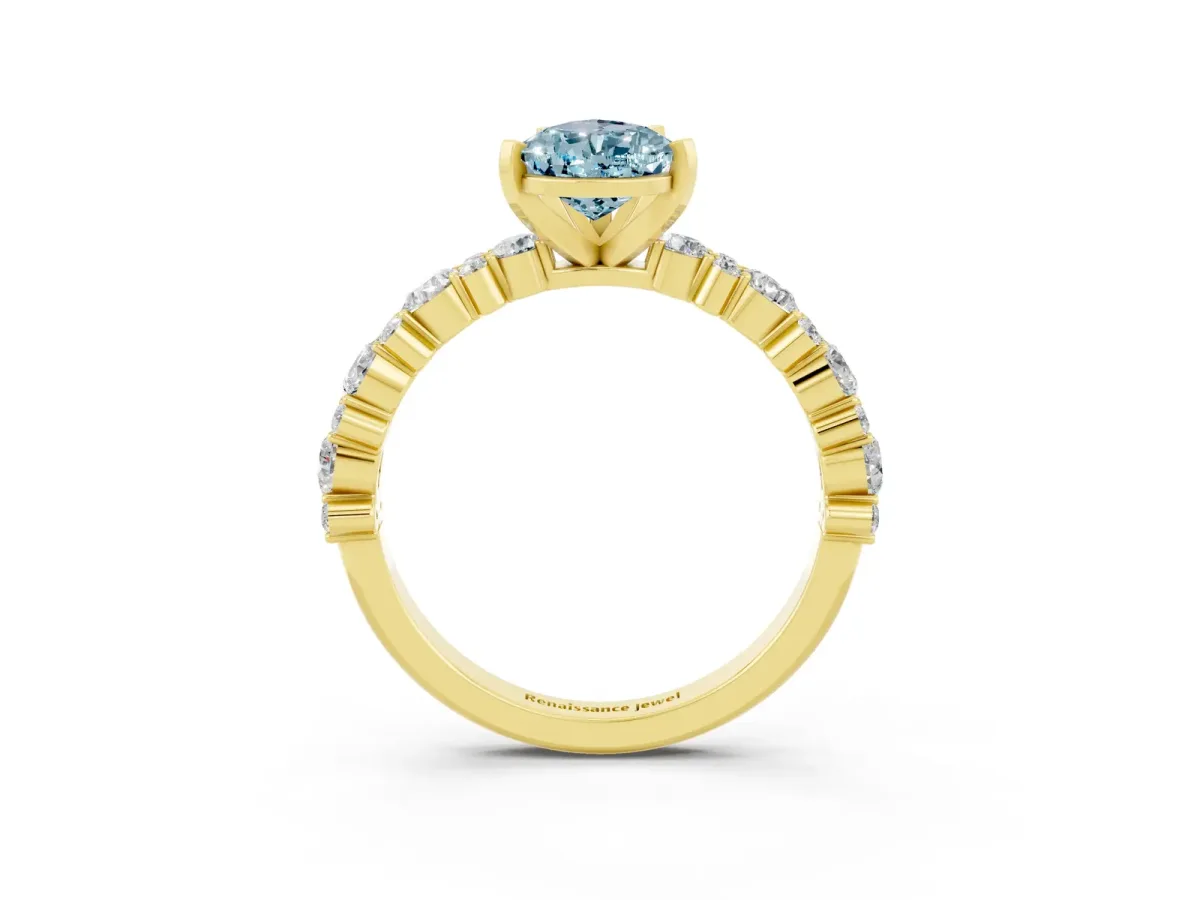 Pear Cut Aquamarine Side Stone Solitaire Ring with Round and Four-Prong Setting Yellow gold