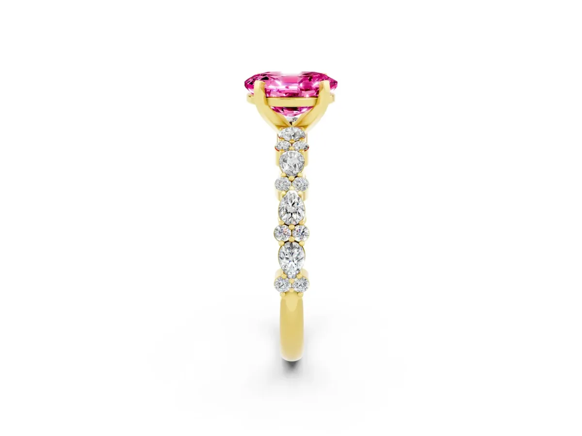Oval Cut Pink Sapphire Side Stone Solitaire Ring with Round and Four-Prong Setting Yellow gold