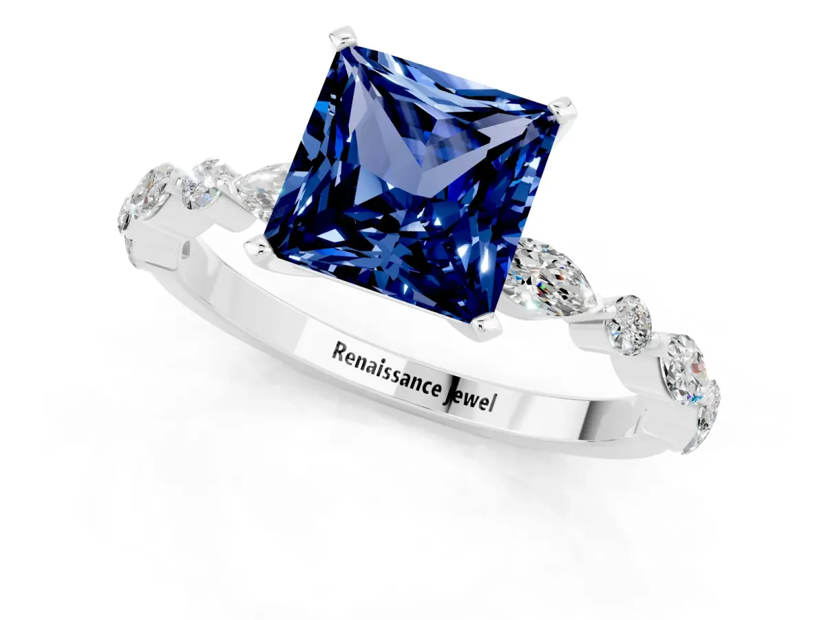 Princess Cut Blue Sapphire Ring with Marquise and Round Side Stones and Four-Prong Setting Silver