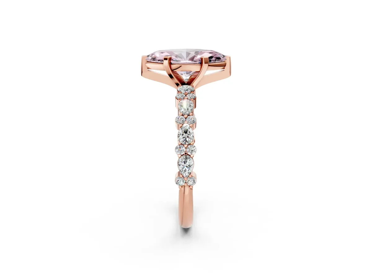 Fancy Pink Marquise Cut Diamond Side Stone Solitaire Ring with Round and Four-Prong Setting Rose gold