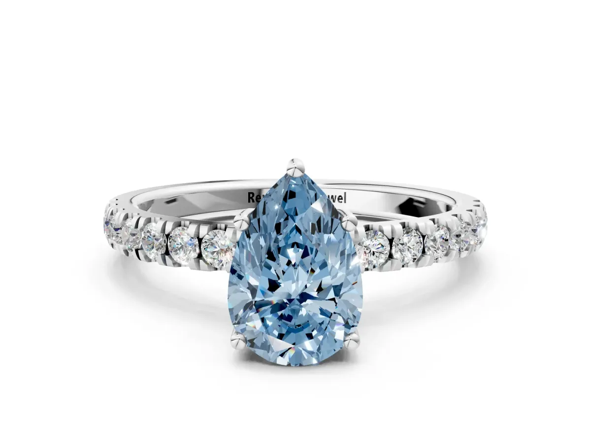 Fancy Blue Pear Cut Diamond Pave Band Solitaire Ring with Round and Prong Setting Platinum