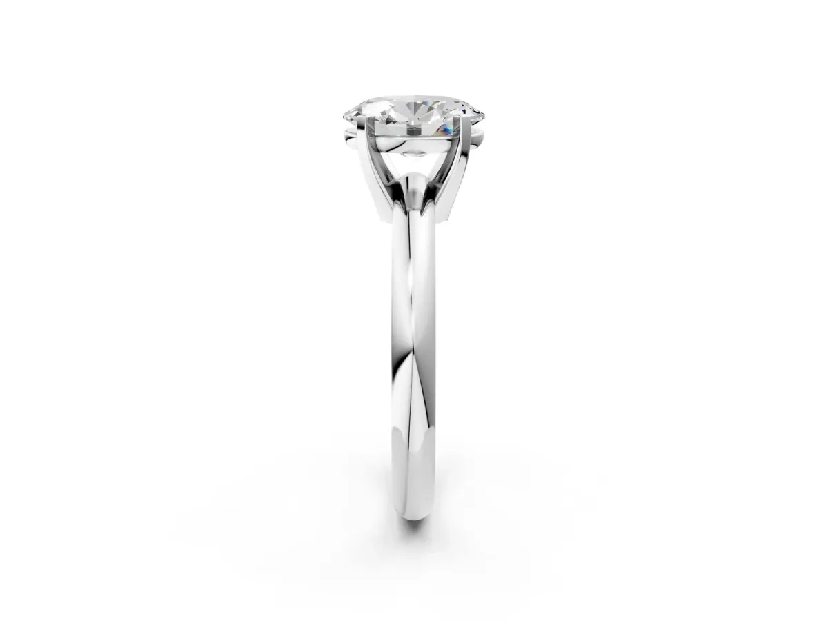 Oval Cut Diamond Solitaire Engagement Ring with Round Band and Four-Prong Setting White gold