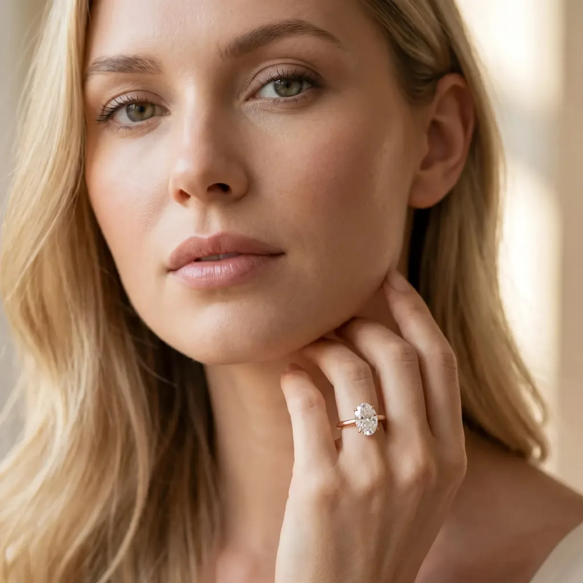 Oval Cut Diamond Solitaire Engagement Ring with Classic Band and Four-Prong Setting Rose gold