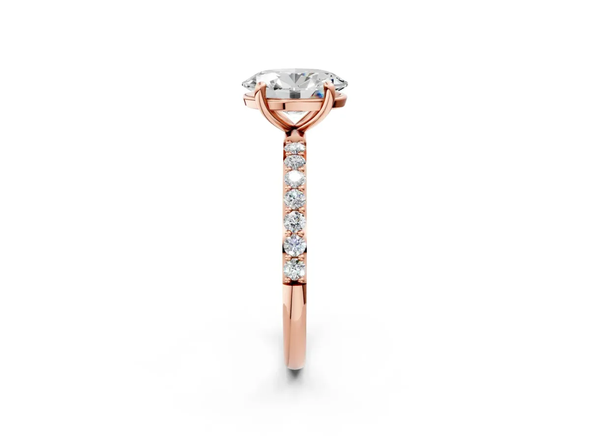 Oval Cut Diamond Solitaire Ring with Round Moissanite Pavé Band and Prong Setting Rose gold