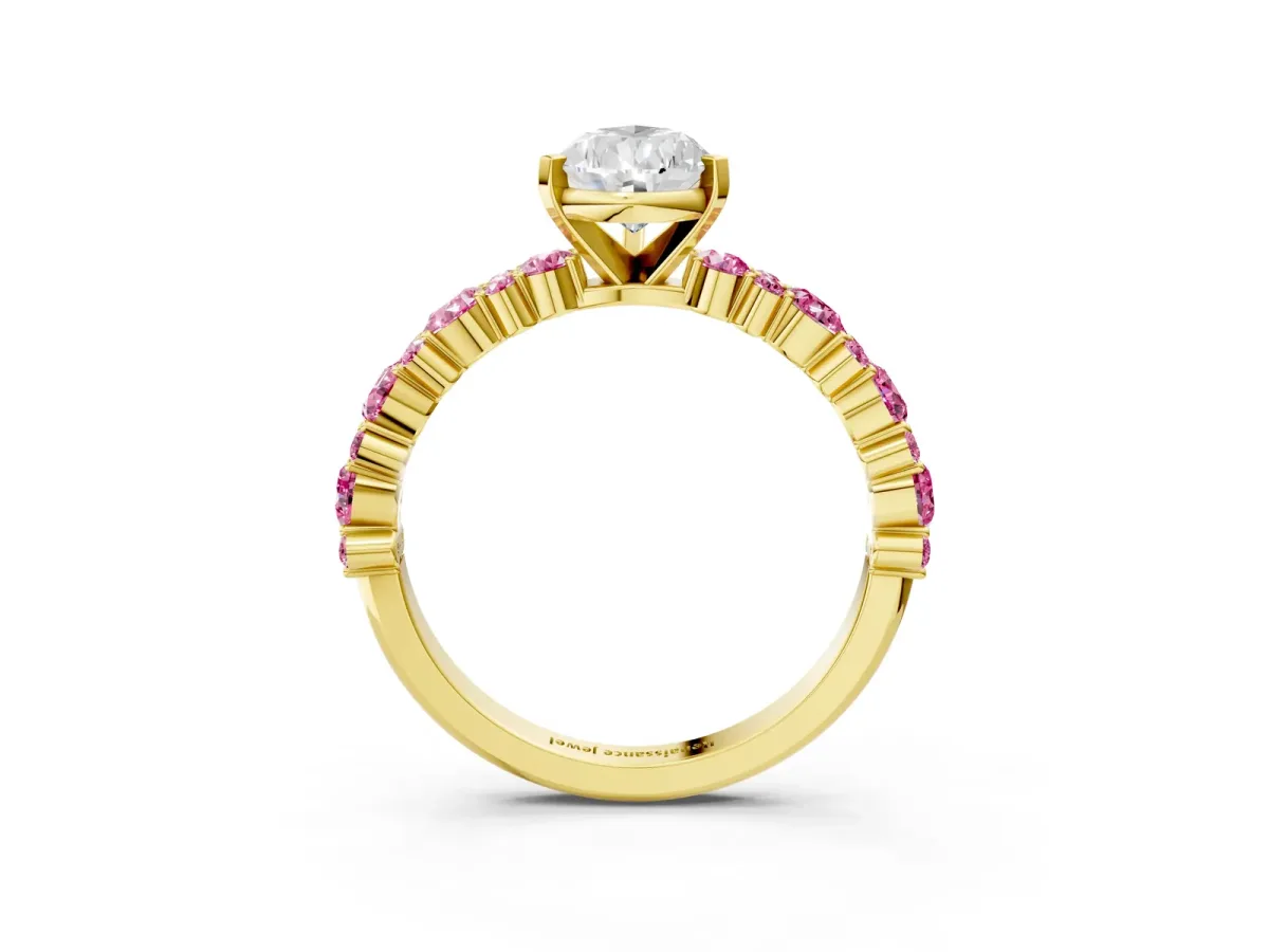 Pear Cut Diamond Side Stone Solitaire Ring with Round Pink Sapphire and Four-Prong Setting Yellow gold