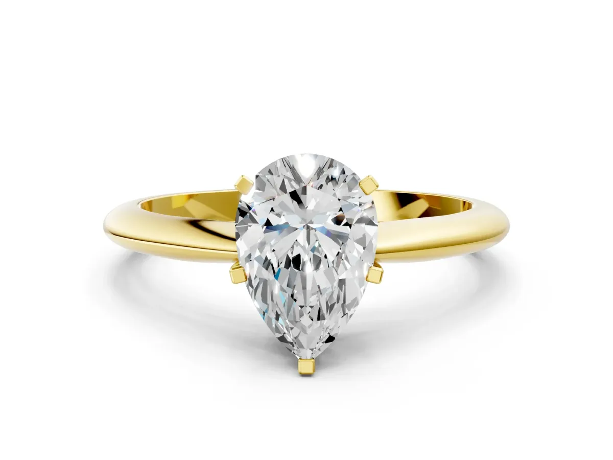 Pear Cut Diamond Solitaire Engagement Ring with Classic Band and Four-Prong Setting Yellow gold