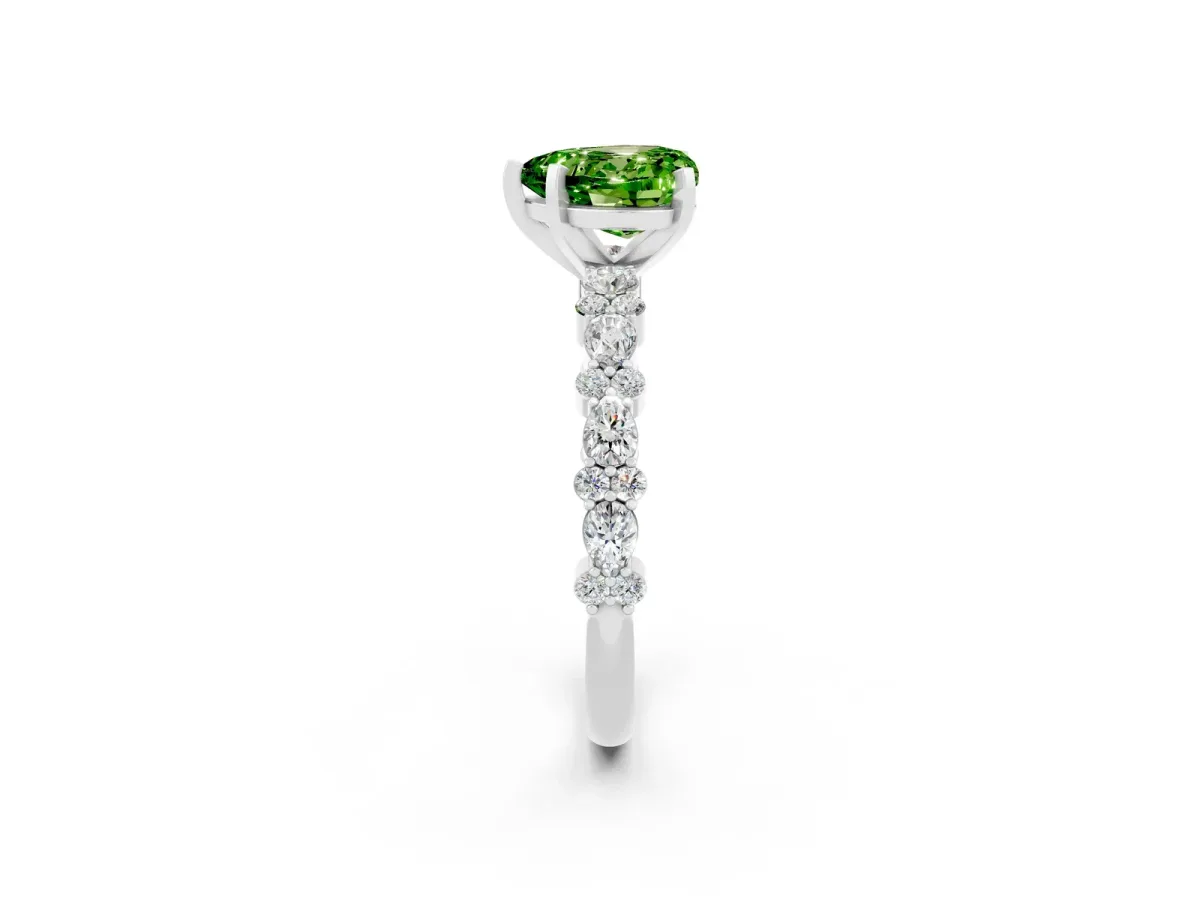 Heart Cut Peridot Side Stone Solitaire Ring with Round and Four-Prong Setting Platinum