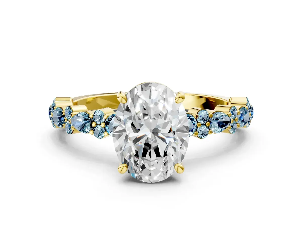 Oval Cut Diamond Side Stone Solitaire Ring with Round Aquamarine and Four-Prong Setting Yellow gold
