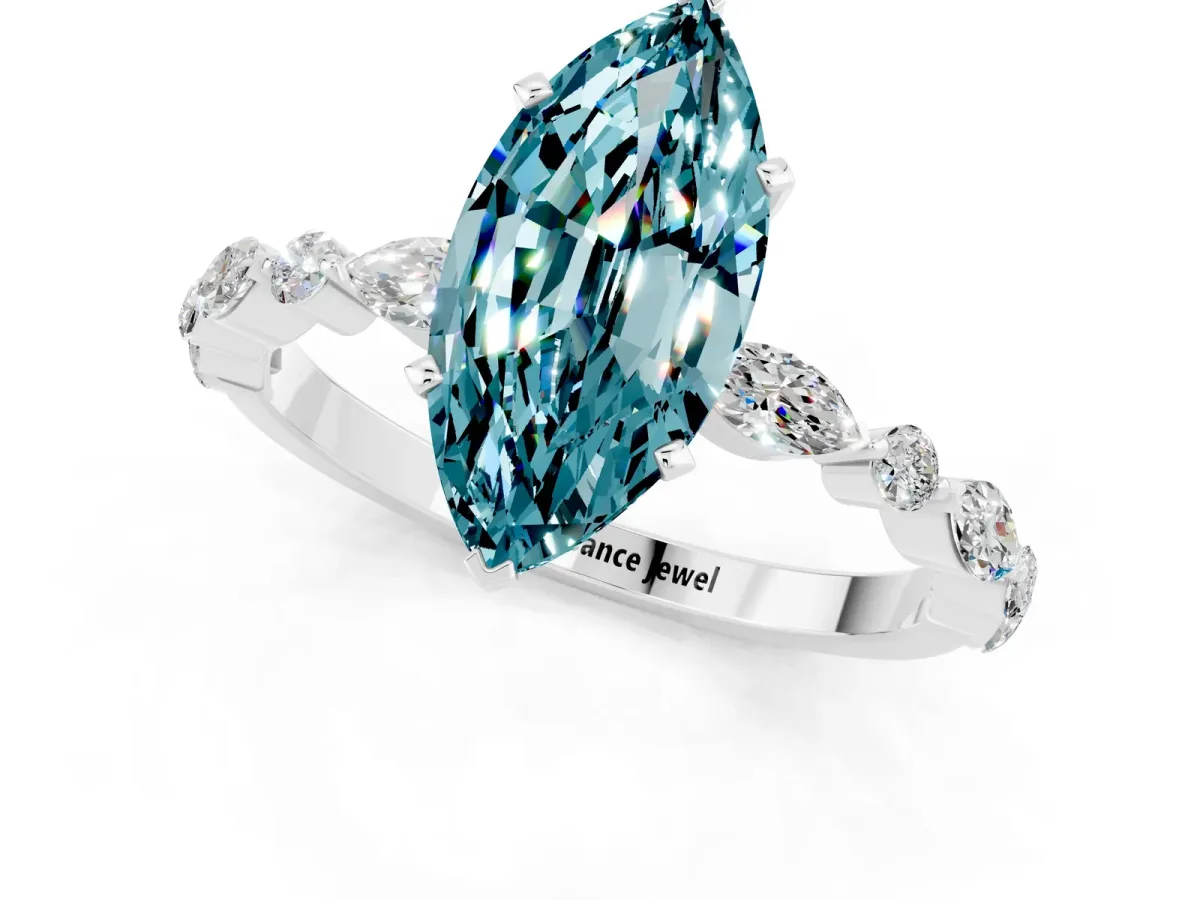 Marquise Cut Blue Topaz Ring with Marquise and Round Side Stones and Four-Prong Setting Silver
