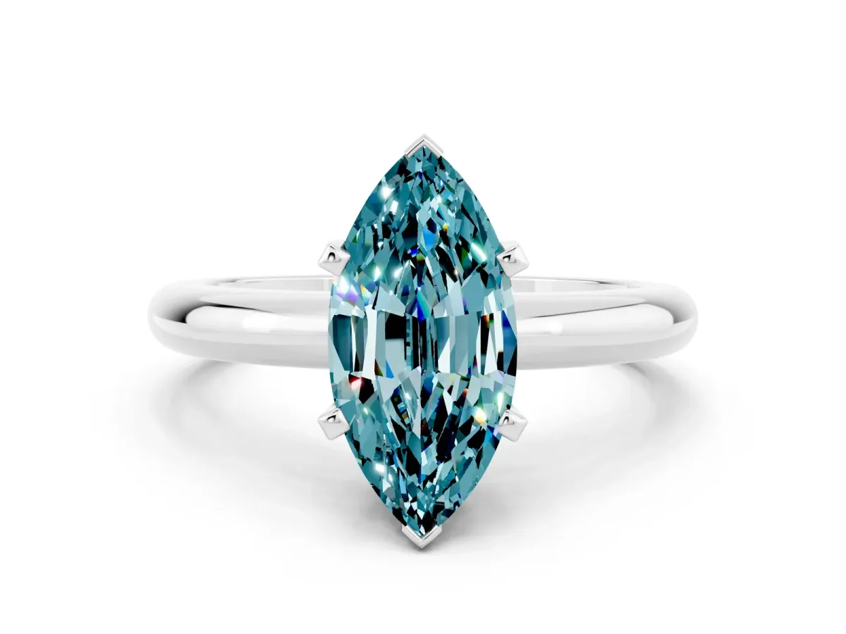 Marquise Cut Blue Topaz Solitaire Engagement Ring with Round Band and Four-Prong Setting Silver