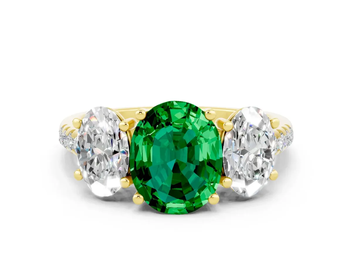 Three-Stone Oval Cut Emerald Ring with Round Pavé Band and Prong Setting Yellow gold