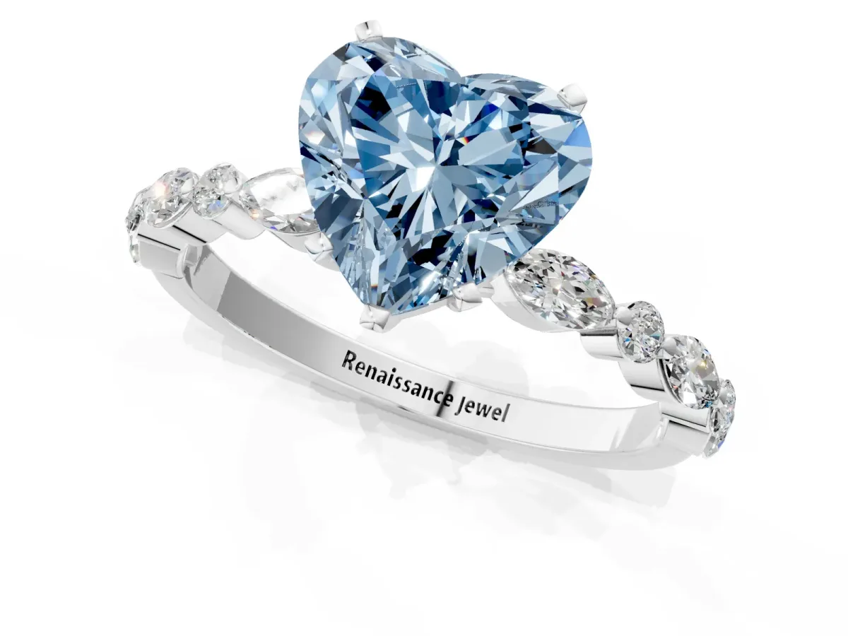 Fancy Blue Heart Cut Diamond Ring with Marquise and Round Side Stones and Four-Prong Setting Silver