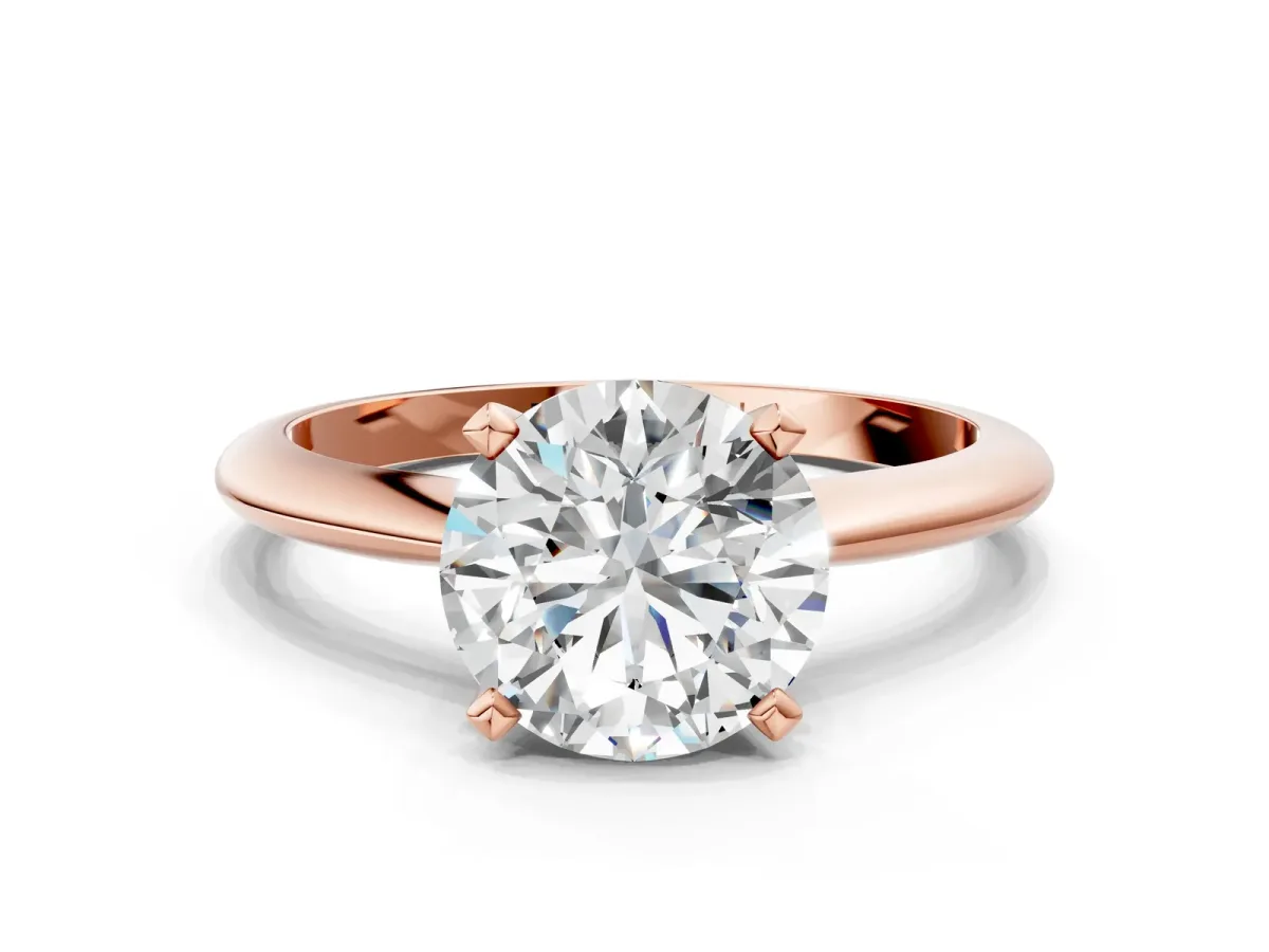 Round Cut Diamond Solitaire Engagement Ring with Classic Band and Four-Prong Setting Rose gold