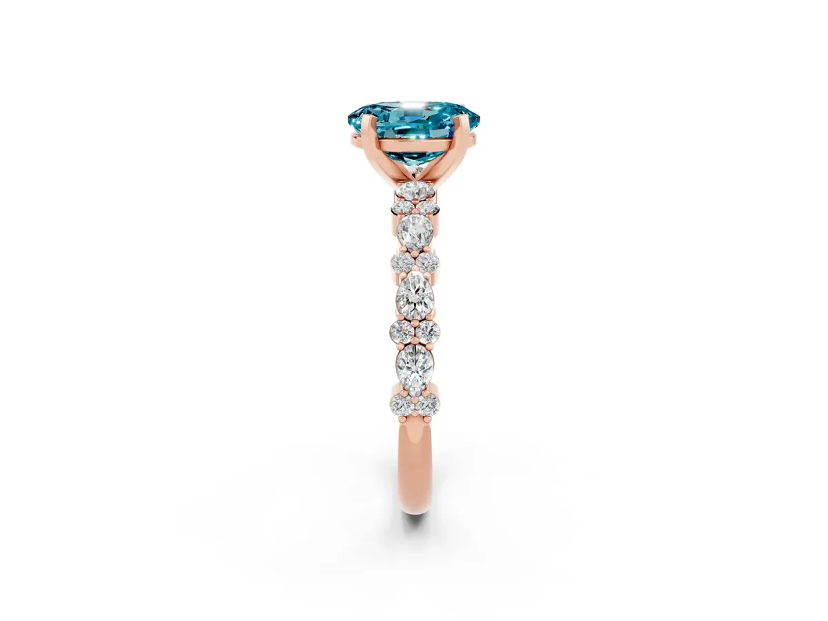 Oval Cut Blue Topaz Side Stone Solitaire Ring with Round and Four-Prong Setting Rose gold