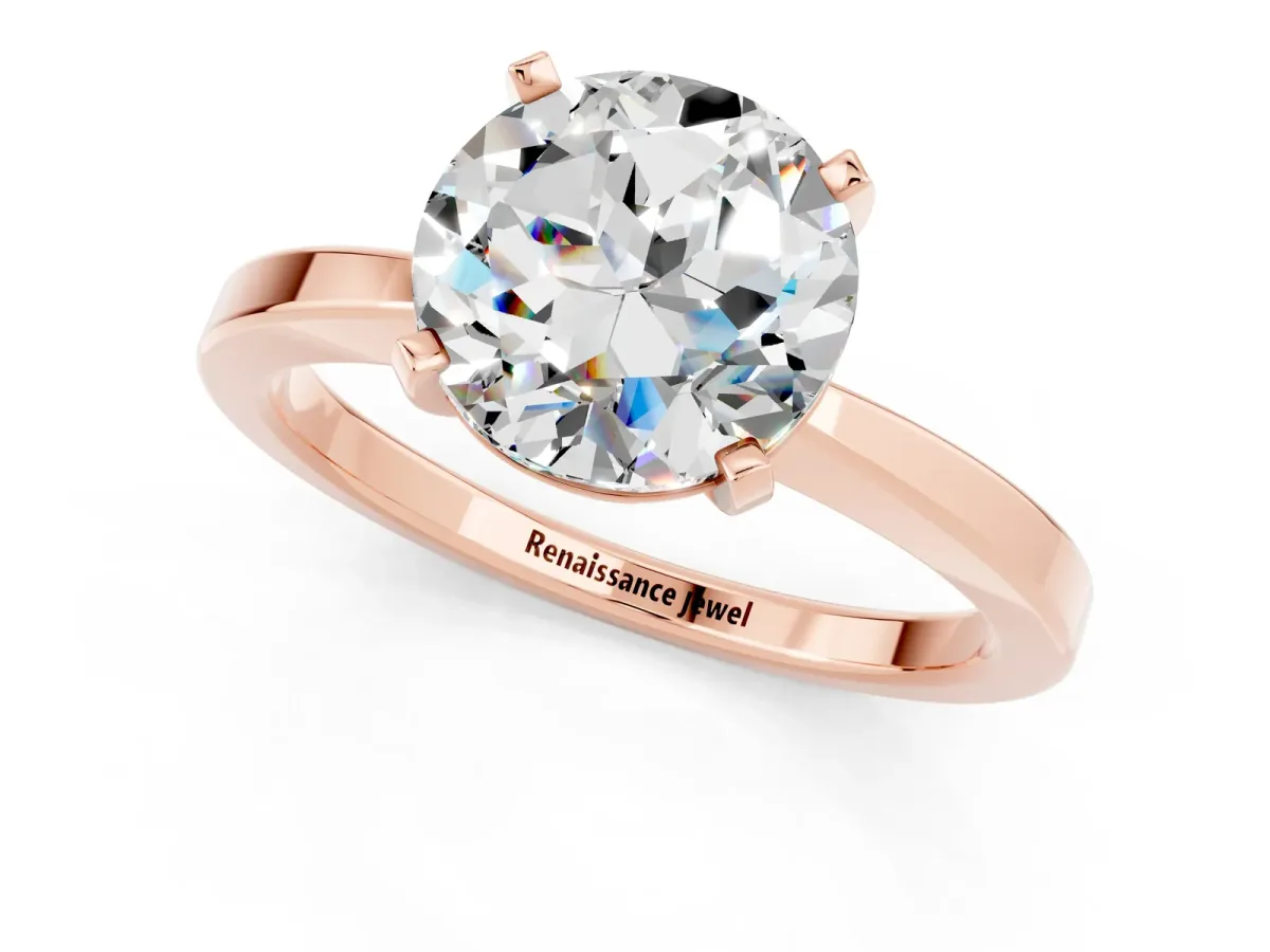 Round Cut Moissanite Solitaire Engagement Ring with Classic Band and Four-Prong Setting Rose gold