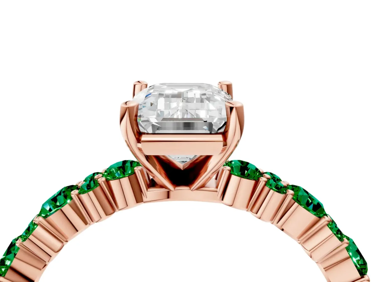 Emerald Cut Diamond Side Stone Solitaire Ring with Round Emerald and Four-Prong Setting Rose gold