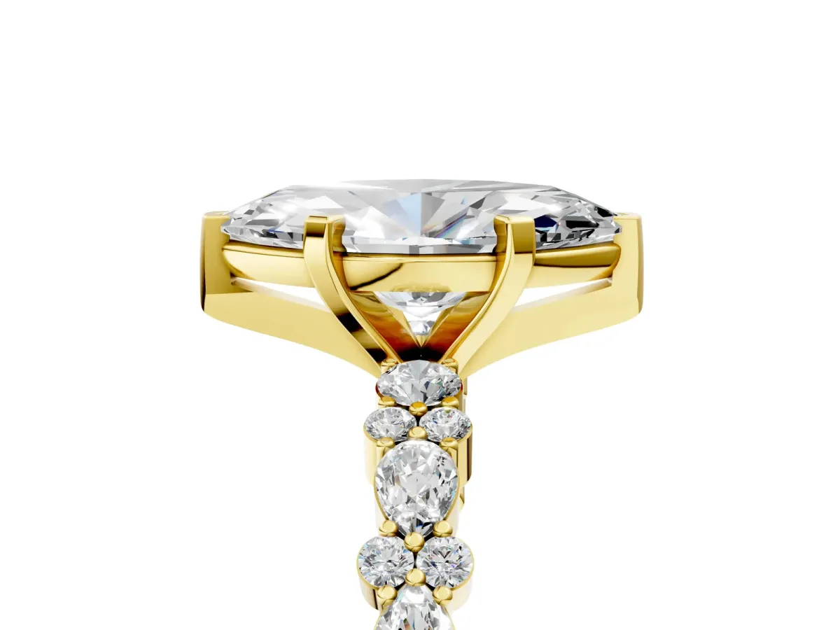 Marquise Cut Diamond Side Stone Solitaire Ring with Round and Four-Prong Setting Yellow gold