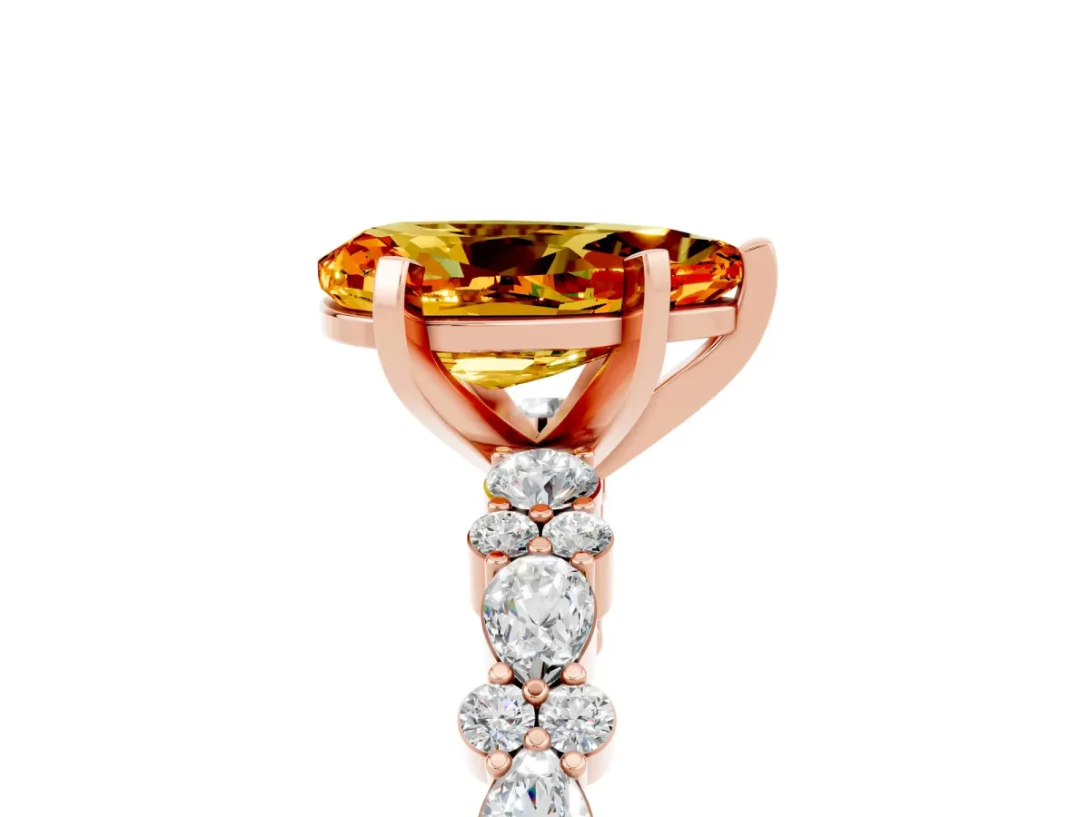 Pear Cut Citrine Side Stone Solitaire Ring with Round and Four-Prong Setting Rose gold