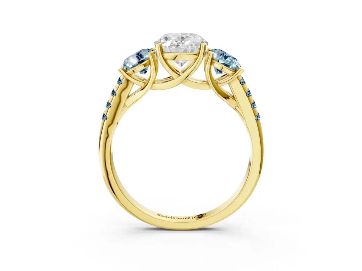 Three-Stone Oval Cut Diamond Ring with Round Aquamarine Pavé Band and Prong Setting Yellow gold