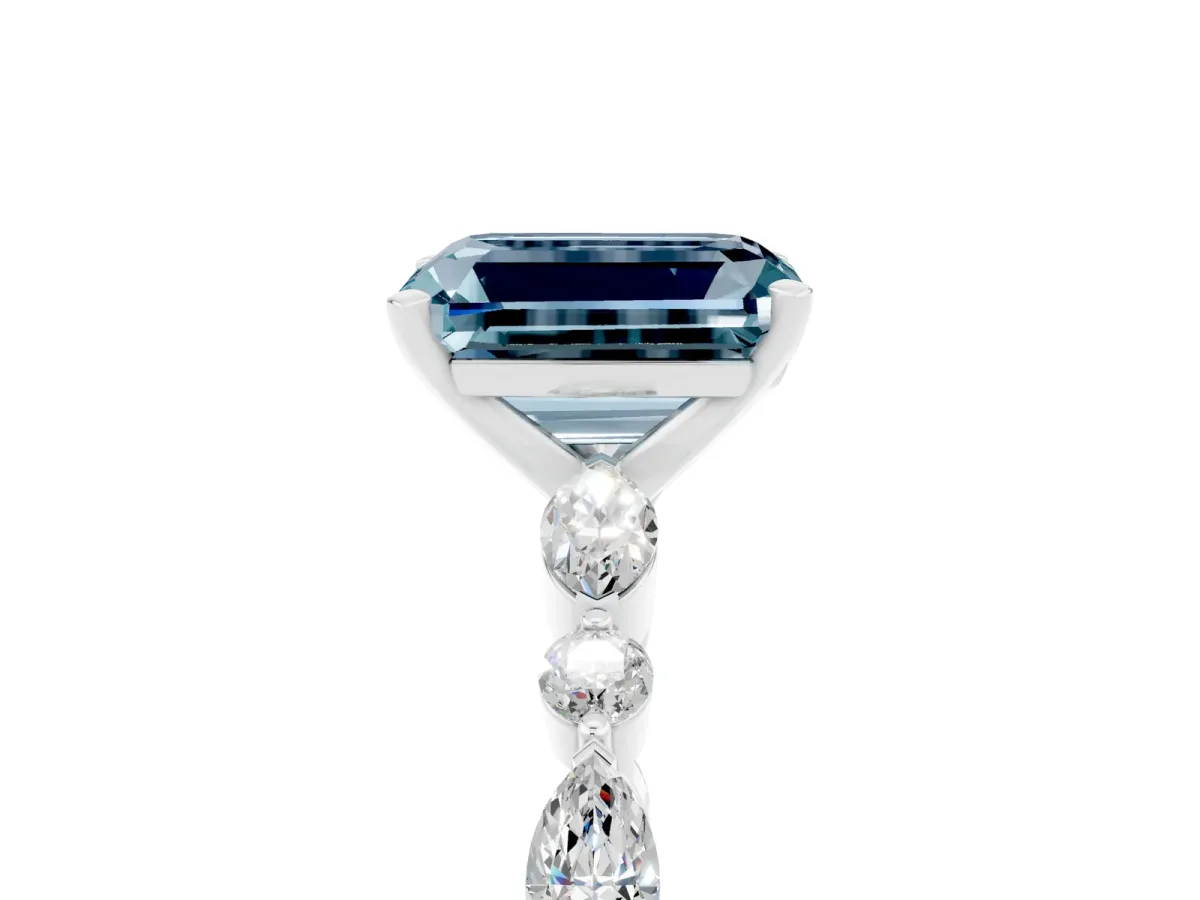Emerald Cut Aquamarine Ring with Marquise and Round Side Stones and Four-Prong Setting Platinum