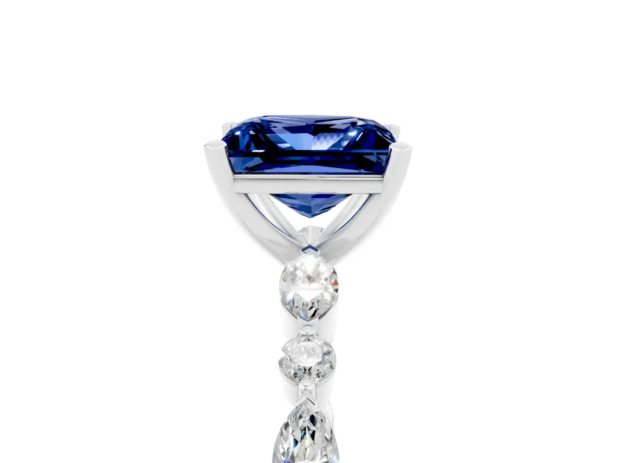 Princess Cut Blue Sapphire Ring with Marquise and Round Side Stones and Four-Prong Setting Silver