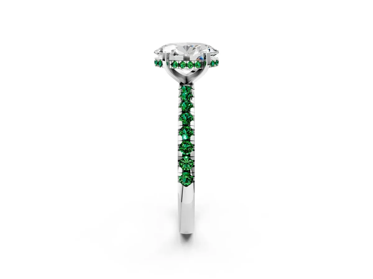 Oval Cut Diamond Solitaire Ring with Round Emerald Pavé Band and Four-Prong Setting White gold