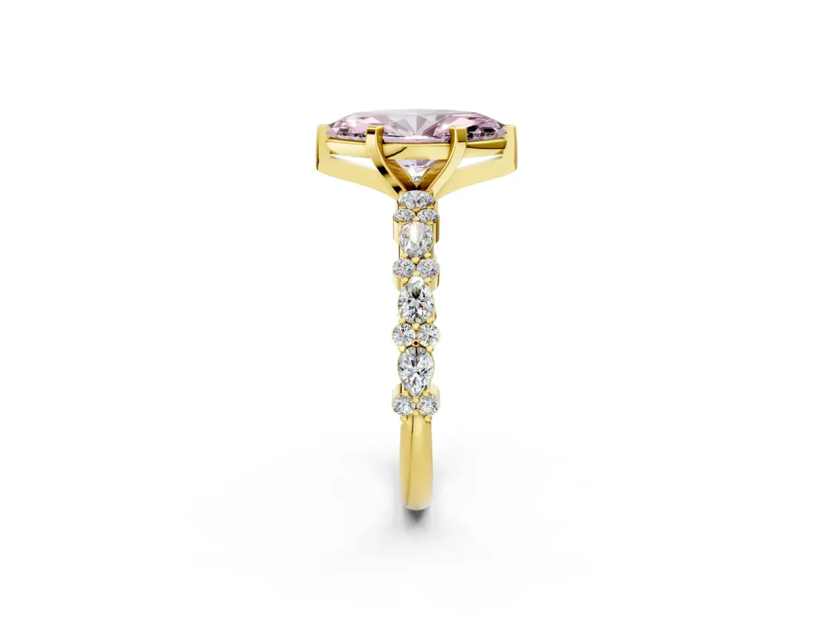 Fancy Pink Marquise Cut Diamond Side Stone Solitaire Ring with Round and Four-Prong Setting Yellow gold