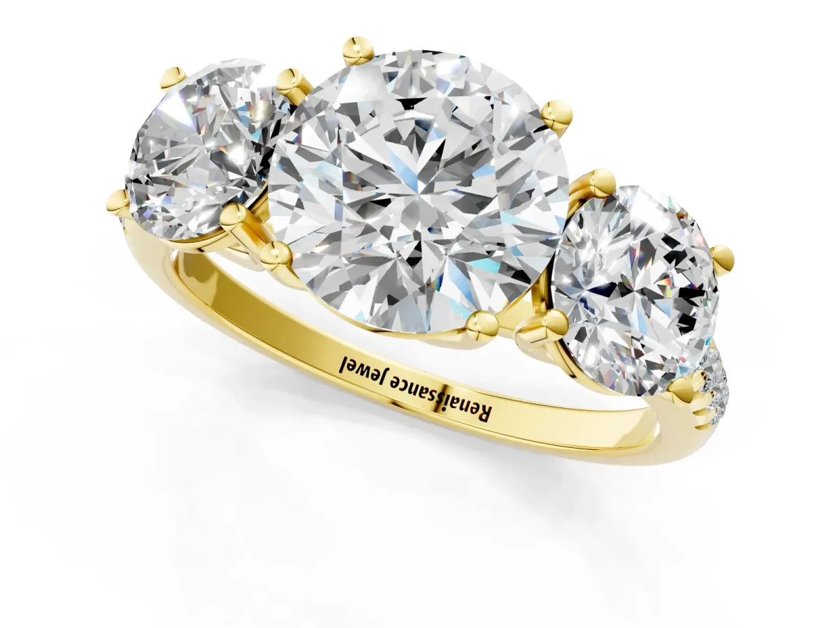 Three-Stone Round Cut Diamond Ring with Round Pavé Band and Prong Setting Yellow gold
