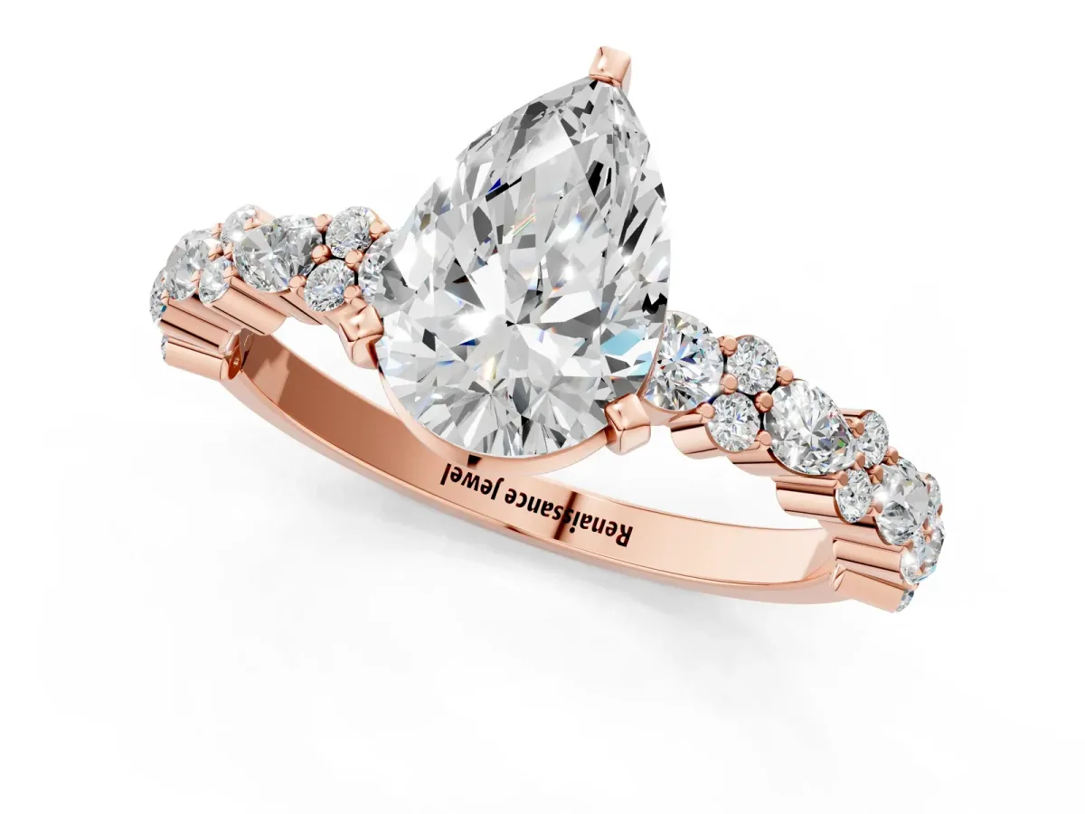 Pear Cut Diamond Side Stone Solitaire Ring with Round Moissanite and Four-Prong Setting Rose gold