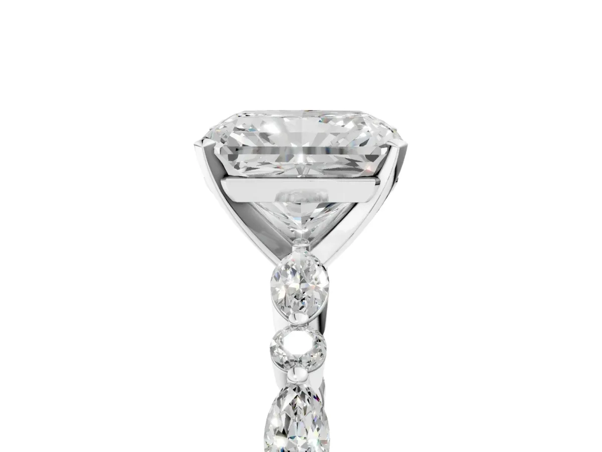 Radiant Cut Diamond Ring with Marquise and Round Side Stones and Four-Prong Setting Platinum