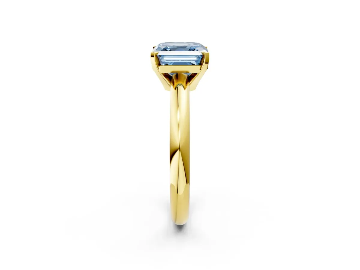 Fancy Blue Asscher Cut Diamond Solitaire Engagement Ring with Round Band and Four-Prong Setting Yellow gold