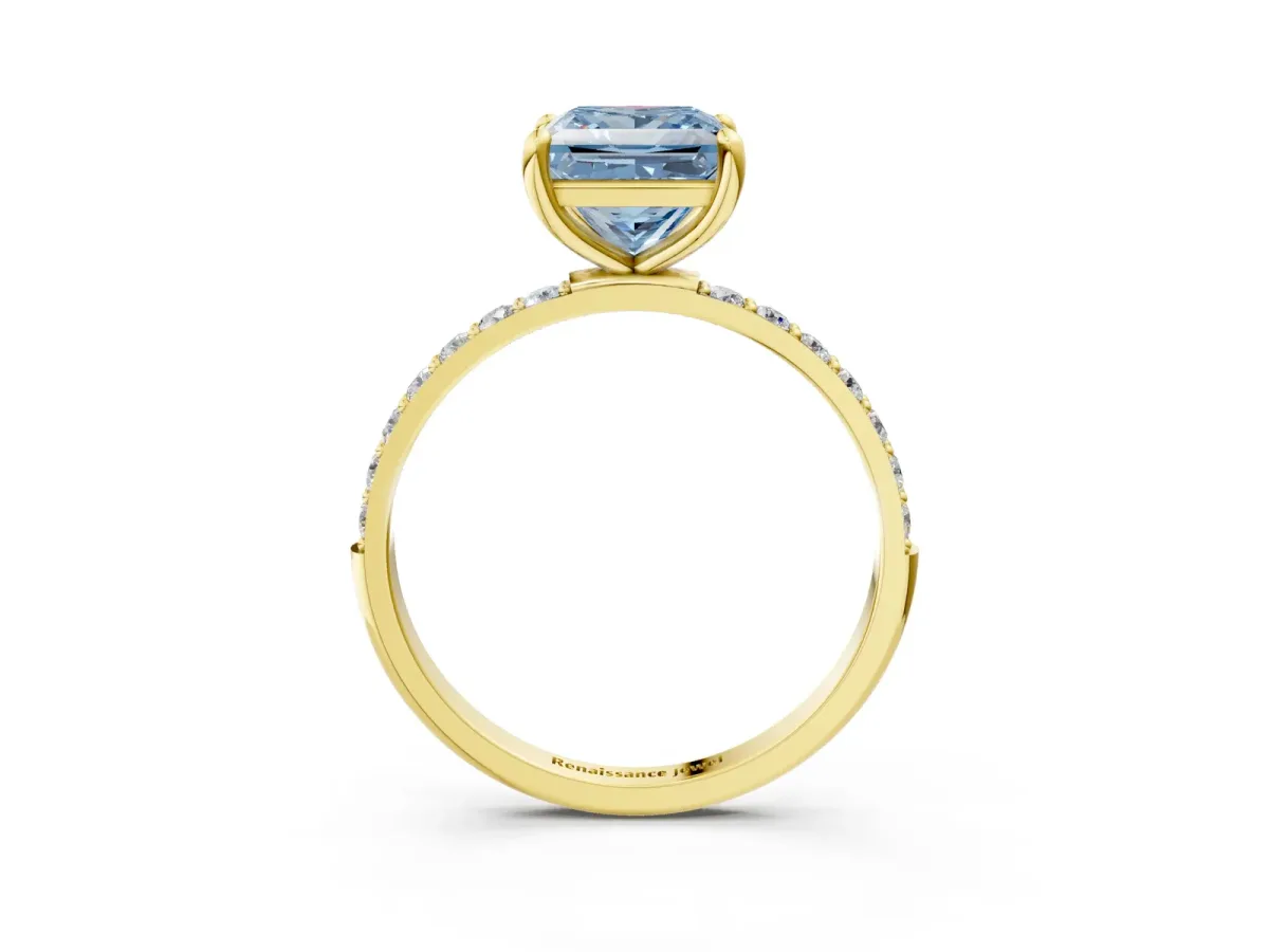 Fancy Blue Princess Cut Diamond Solitaire Ring with Round Pavé Band and Prong Setting Yellow gold