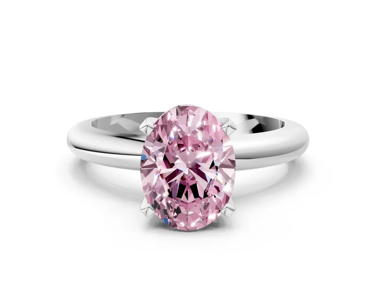 Fancy Pink Oval Cut Diamond Solitaire Engagement Ring with Round Band and Four-Prong Setting Platinum