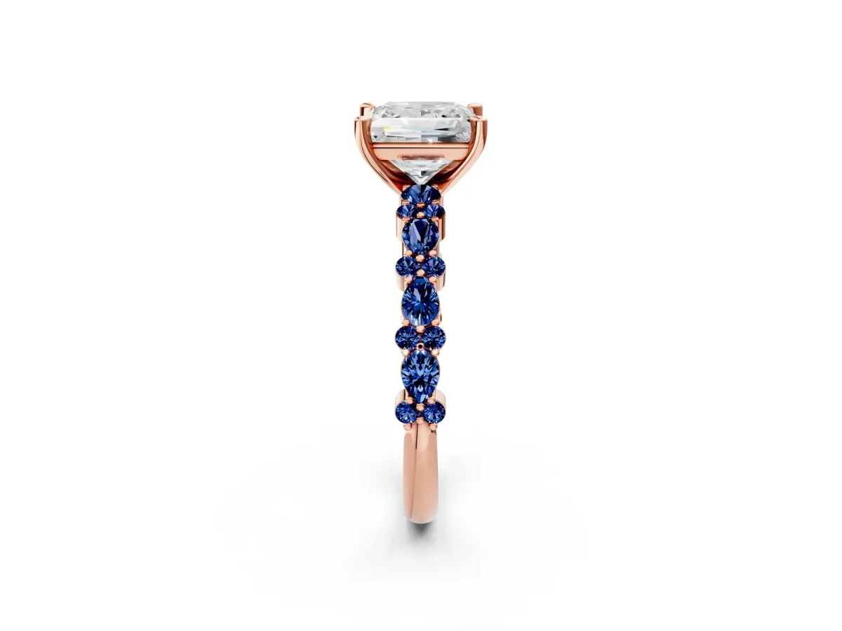 Princess Cut Diamond Side Stone Solitaire Ring with Round Blue Sapphire and Four-Prong Setting Rose gold