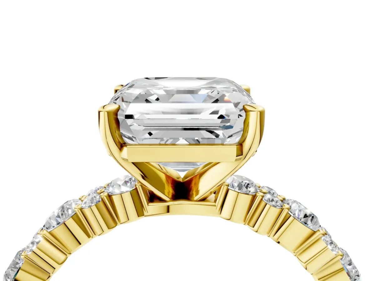 Asscher Cut Diamond Side Stone Solitaire Ring with Round and Four-Prong Setting Yellow gold