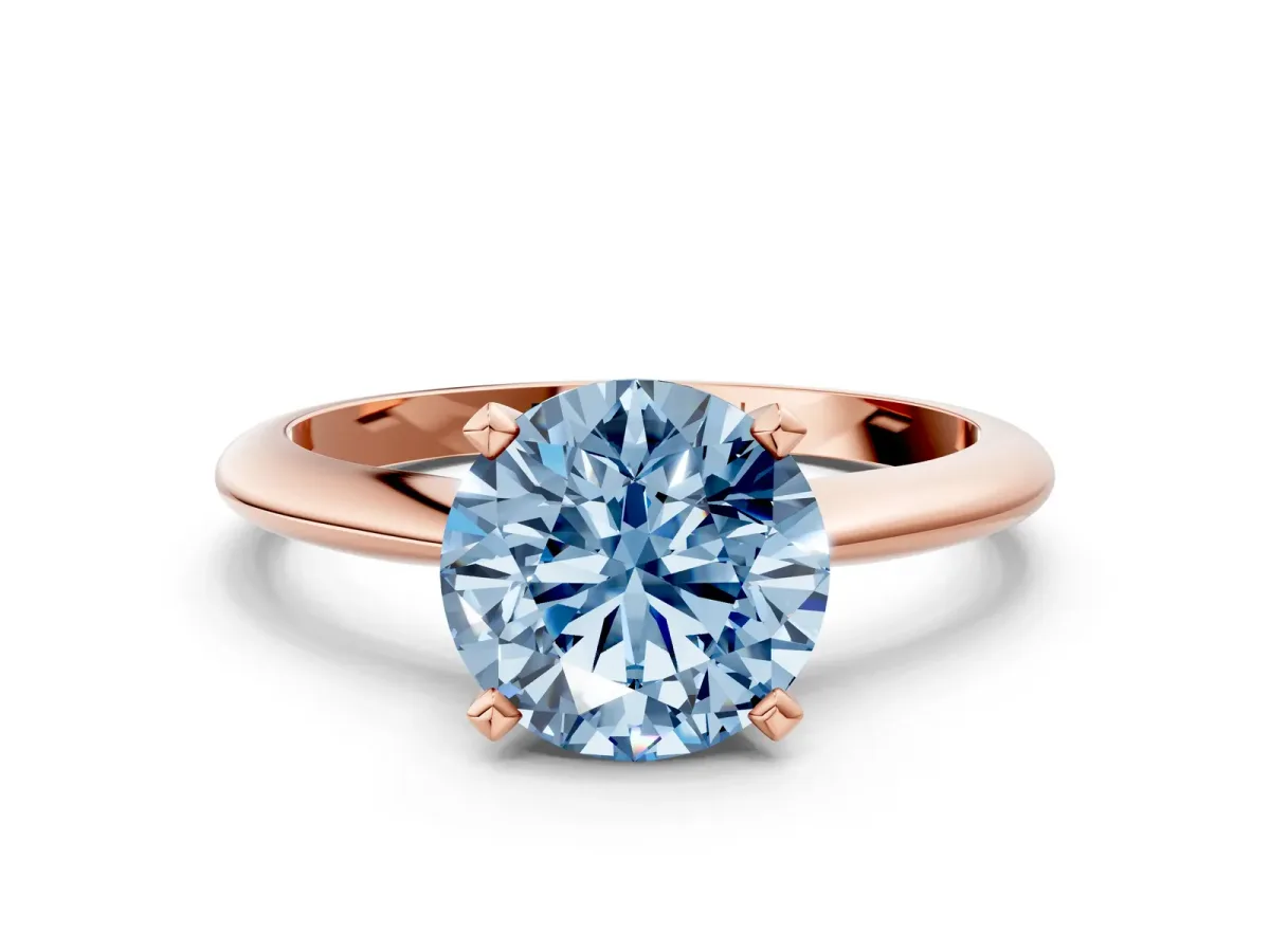 Fancy Blue Round Cut Diamond Solitaire Engagement Ring with Classic Band and Four-Prong Setting Rose gold