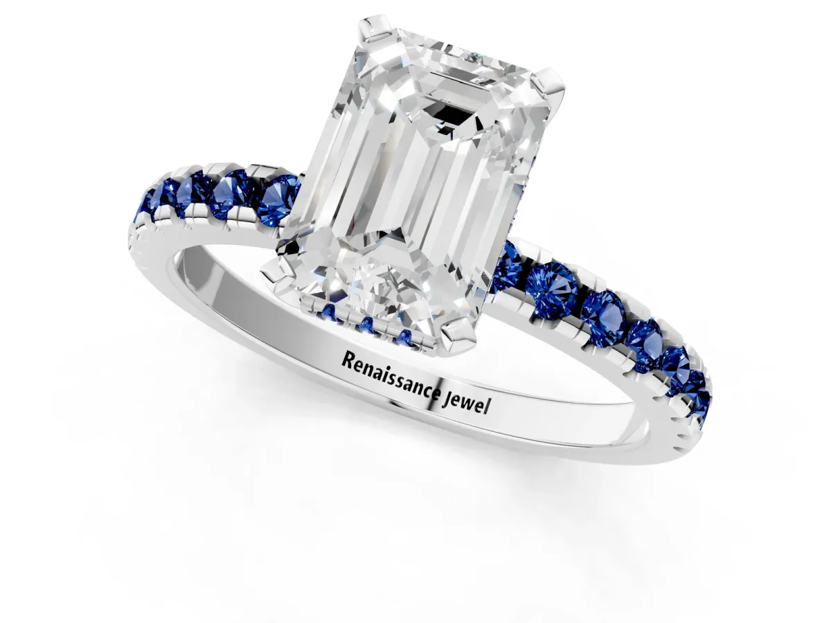 Emerald Cut Diamond Solitaire Ring with Round Blue Sapphire Pavé Band and Four-Prong Setting Silver