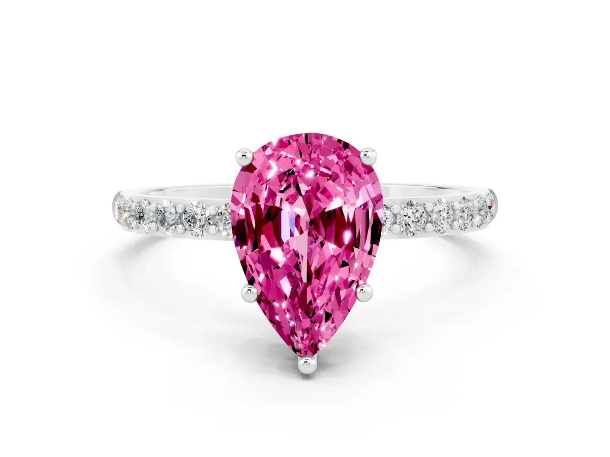 Pear Cut Pink Sapphire Solitaire Ring with Round Pavé Band and Prong Setting Silver