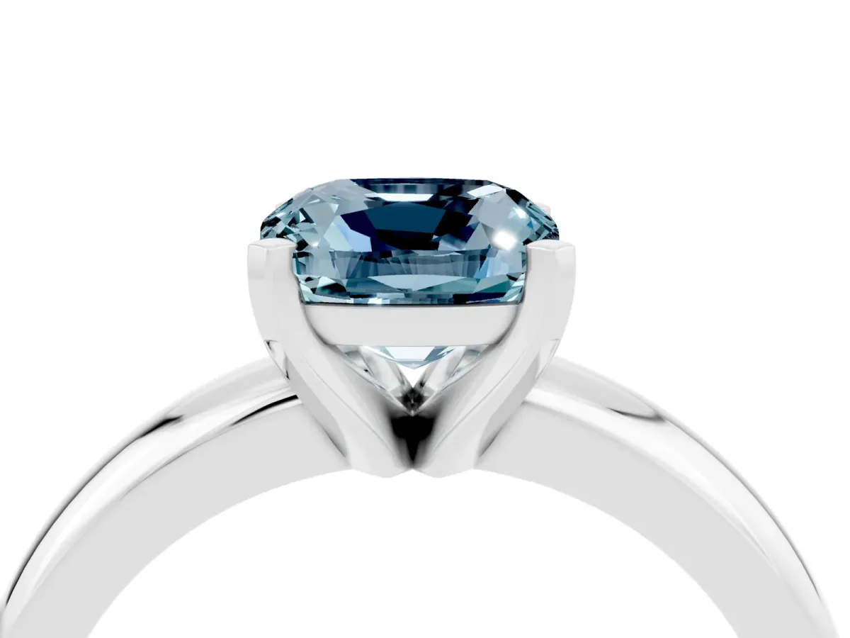 Cushion Cut Aquamarine Solitaire Engagement Ring with Round Band and Four-Prong Setting Silver