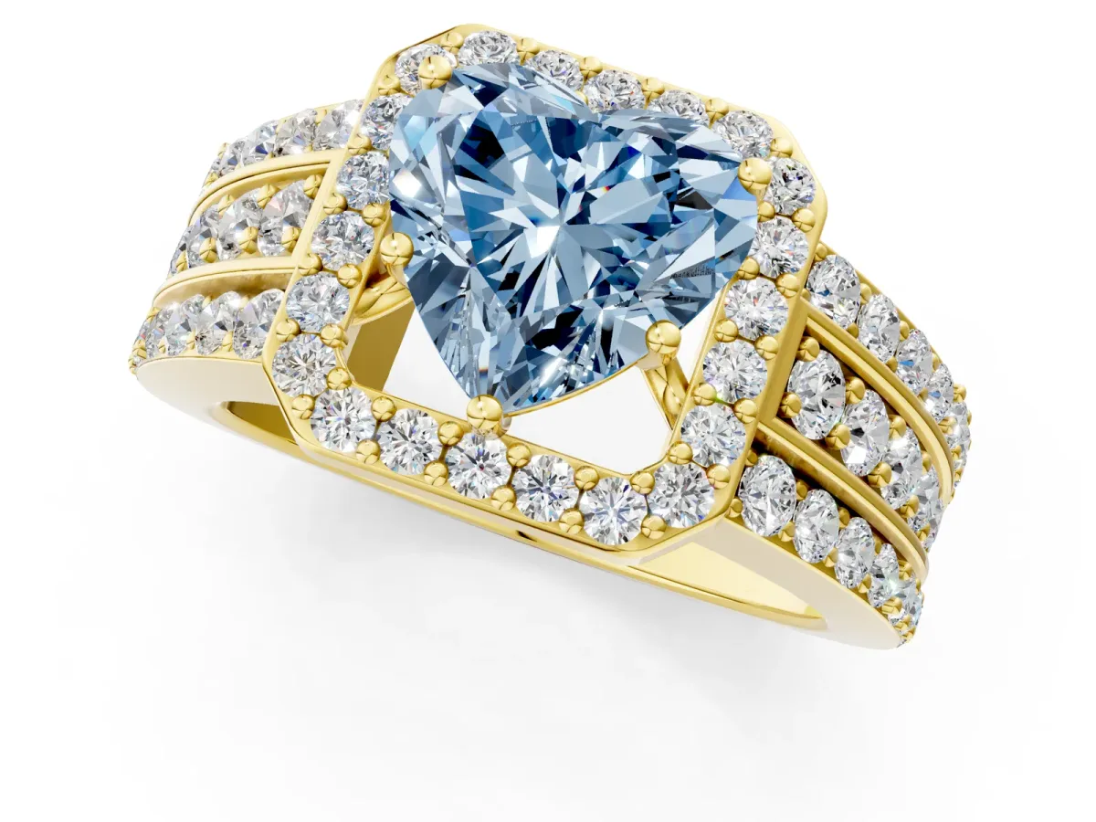 Fancy Blue Heart Cut Halo Diamond Ring with Round Split Shank and Prong Setting Yellow gold
